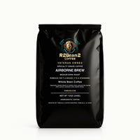 Black coffee bag with R2Bean2 Coffee branding on a white background